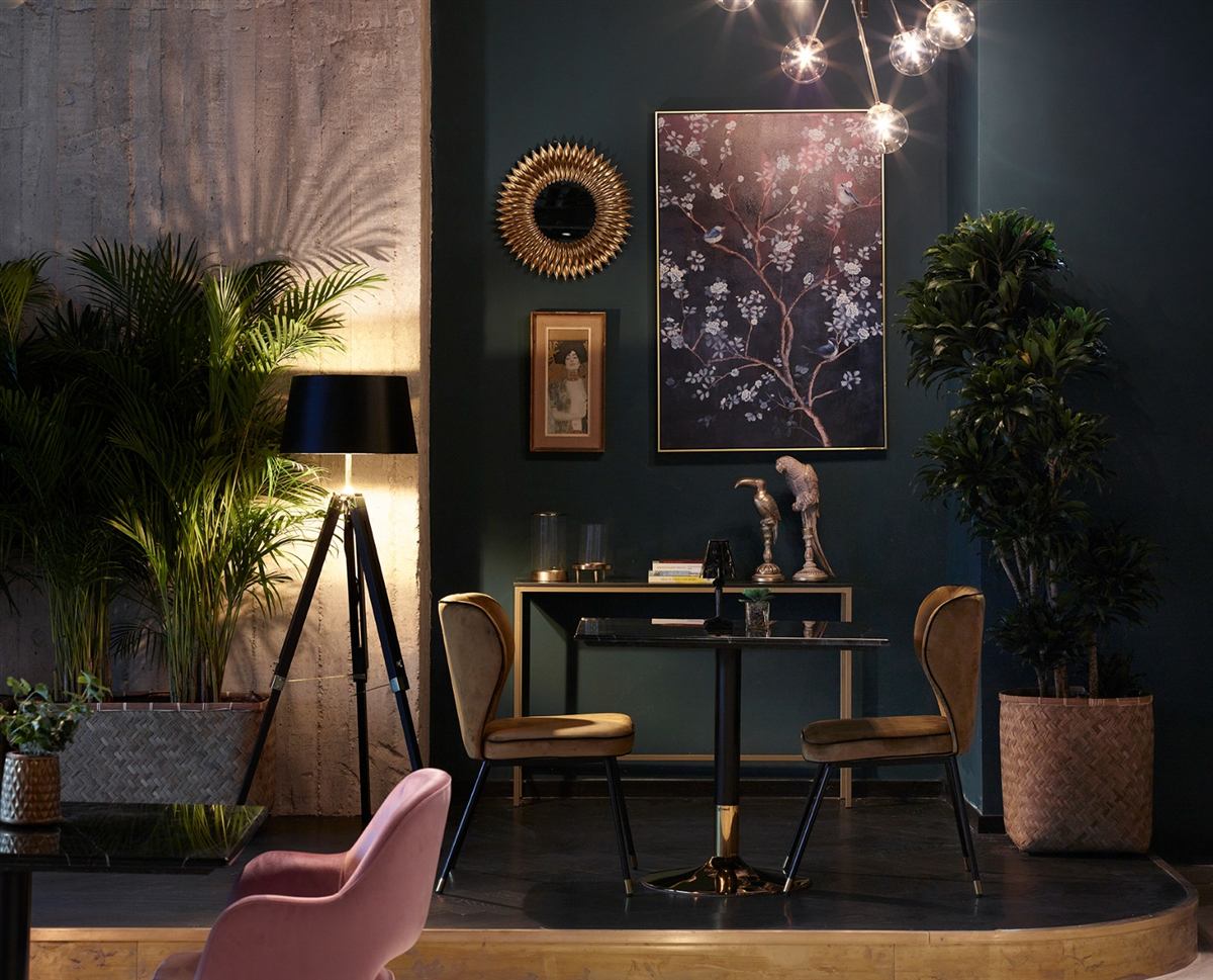 Dark green lounge interior with brass details, Skylark hotel